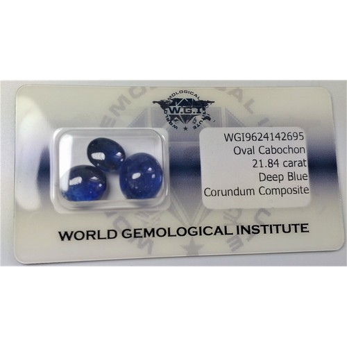 1053 - Three certificated and security-sealed blue cabochon oval deep blue sapphires. 21.84ct. Cert no. WGI... 