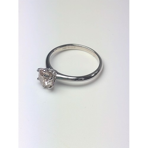 1055 - An 18ct white gold 1.01ct Round Brilliant Cut diamond solitaire ring. Certificated. Cert no. WGI9624... 