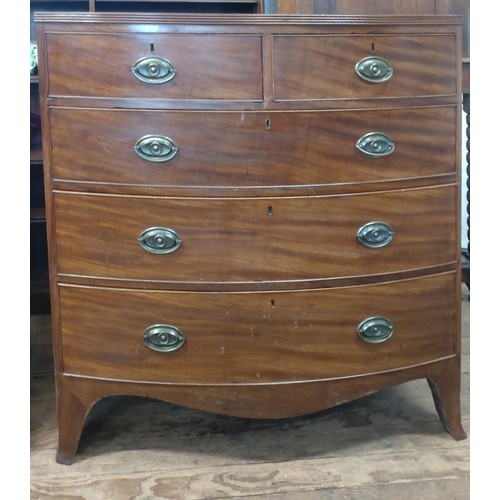 65 - A bow front chest of drawers: two short over three long drawers. 106cm x 106cm x 53cm.