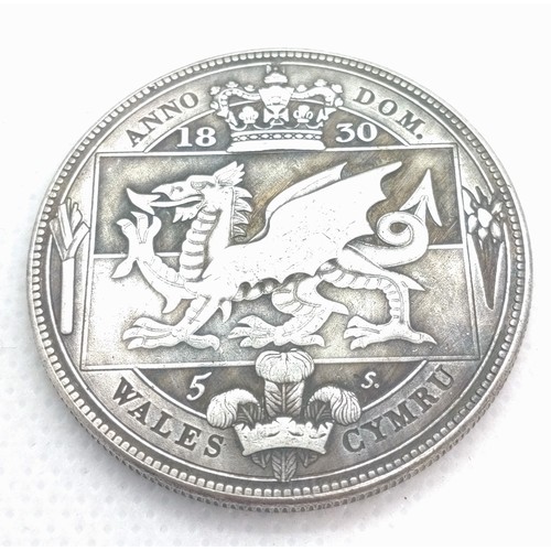 504 - A William IV Welsh silver crown. Dated 1830. Possibly a reproduction. 26.7gms.