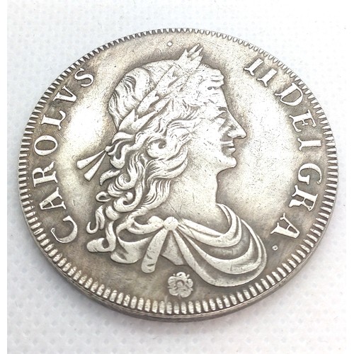 512 - A Reproduction Charles II silver crown dated 1662. 24.2gms.