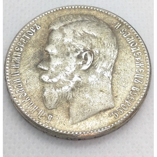 515 - A Russian silver coin, dated 1902. 19.6gms.