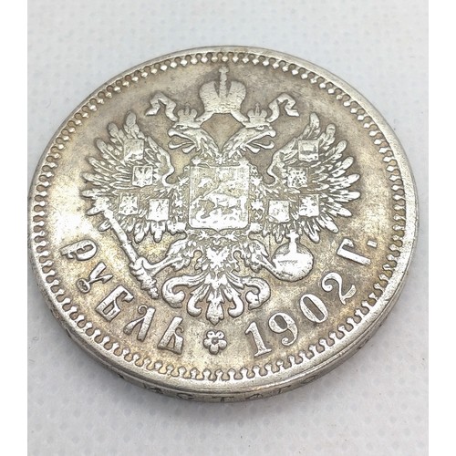 515 - A Russian silver coin, dated 1902. 19.6gms.