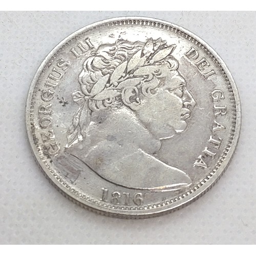 509 - A George III silver half crown, 1816. 13.9gms.