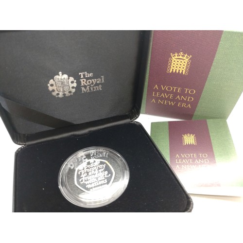 446 - A Royal Mint Vote to Leave sterling silver 50p piece with packaging.