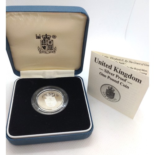 444 - A silver proof £1 coin. £1988. Fitted case.