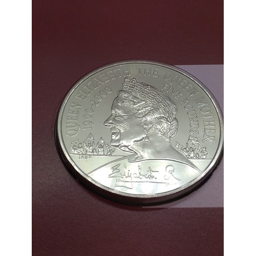 469 - A Queen Elizabeth the Queen Mother centenary nickel crown with packaging.