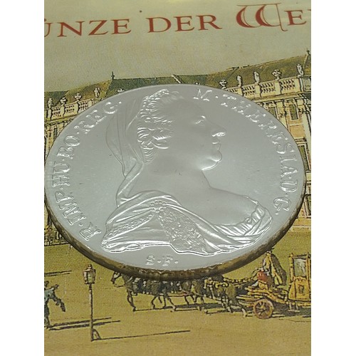 470 - A silver Maria Theresa taler  with packaging