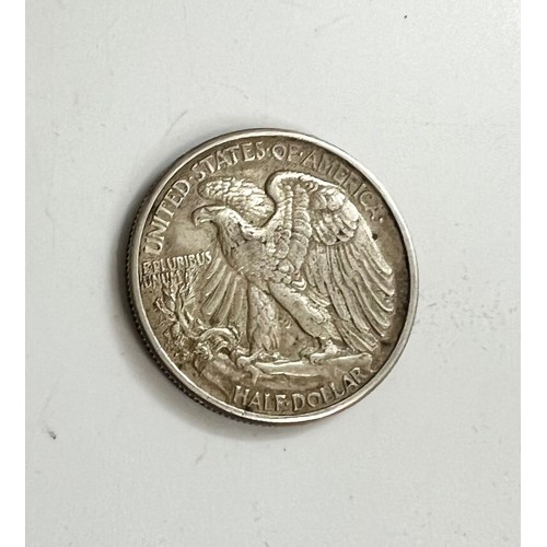 492 - A 1942 American silver-clad half dollar. 12.4gms