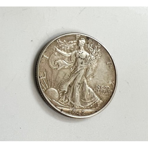 492 - A 1942 American silver-clad half dollar. 12.4gms