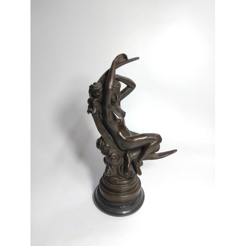 101 - Two Spelter figures, one ballerina (Chiparus) 45cm and one nude reclining in a crescent moon (Nude o... 