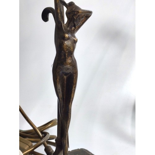 104 - Two reproduction Spelter lamps, one a nude lady, one a floral decoration