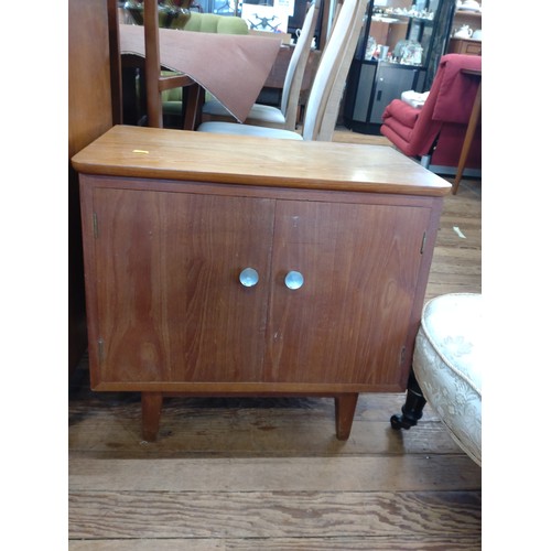 66 - A teak cabinet. 56cm x 61cm x 35cm