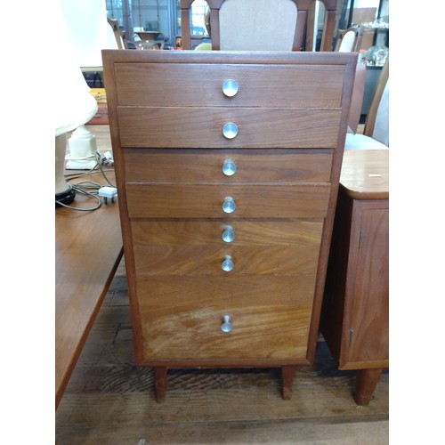 65 - A teak tallboy chest of drawers. 78cm x 40cm x 39