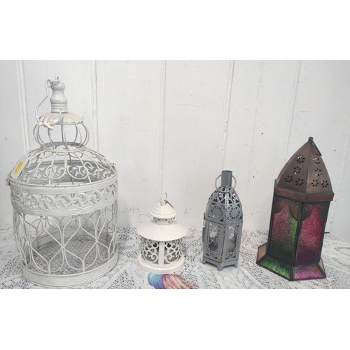 109 - Four metal and glass hanging lanterns- 46cm, 30cm, 23cm, and 16cm. (4)