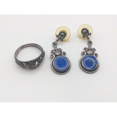 427 - A pair of sterling silver drop earrings set with lapis, stem backs, together with a silver ring.