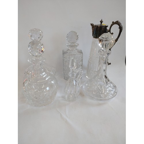 164 - A Mappin & Webb claret jug 29cm and five cut-glass decanters with stoppers, 20cm to 24cm (16)