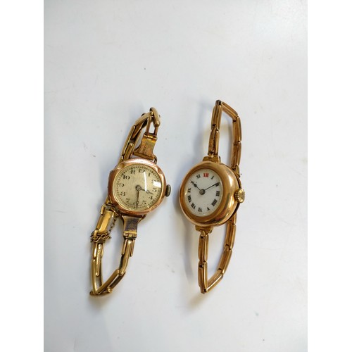 444 - Two 9ct gold dress watches. 37.5 grams (all in)