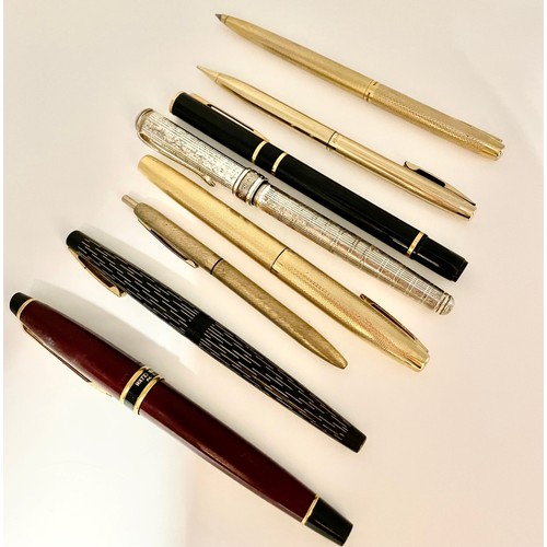 312 - A group of eight pens, to include two Waterman examples, a silver plated Links of London pen, four g... 