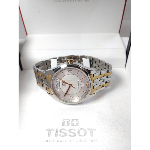 318 - A gentlemen's Bicolour Tissot 'T-One' Automatic Day/Date, round silver dial, gold Arabic numbers/bat... 