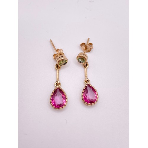 288 - A pair of 9ct yellow gold, pink topaz, and peridot drop earrings, each collet-set with a round-cut p... 