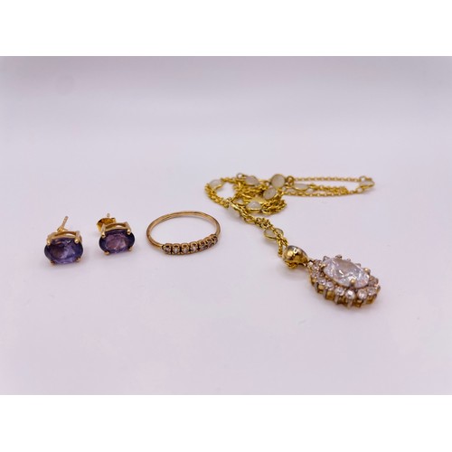 306 - A yellow metal and seven stone diamond ring, shank unmarked (likely gold), size M, together with a p... 