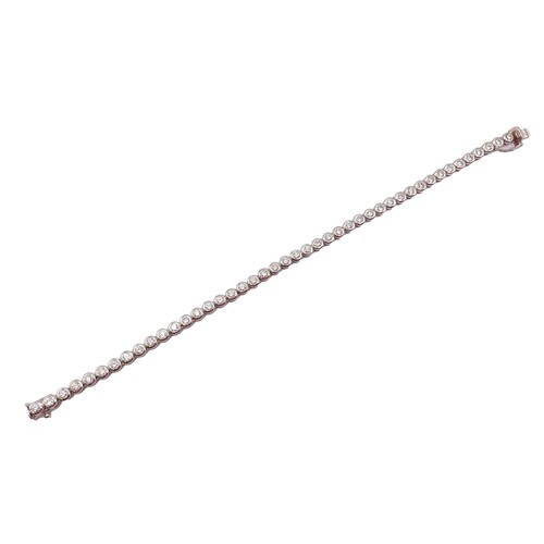 280 - An 18ct white gold and diamond tennis bracelet, the collet-set diamonds of approximately 4.40 carats... 