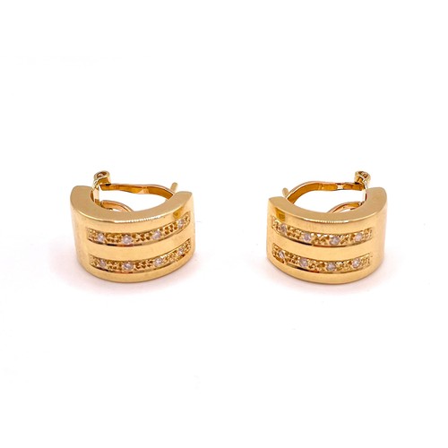 289 - A pair of 18ct yellow gold 'cuff' earrings, each inset with two rows of round brilliant-cut diamond ... 