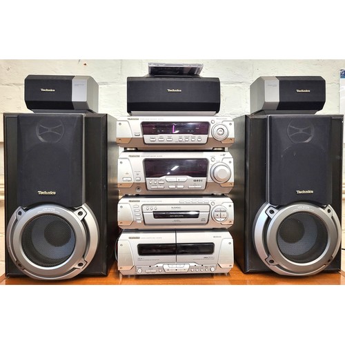 66 - Technics stereo system : a twin cassette deck (RS-EH750), a 5-disc changer system (SL-EH750), a ster... 