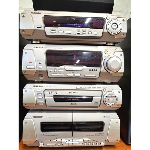 66 - Technics stereo system : a twin cassette deck (RS-EH750), a 5-disc changer system (SL-EH750), a ster... 