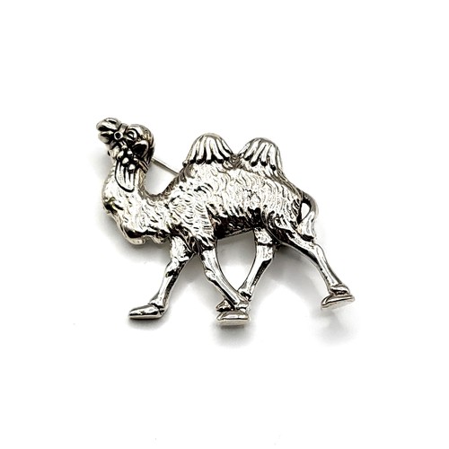 263 - A silver brooch in the form of a Bactrian camel, marked 'sterling' to verso, 4.1 cm wide.