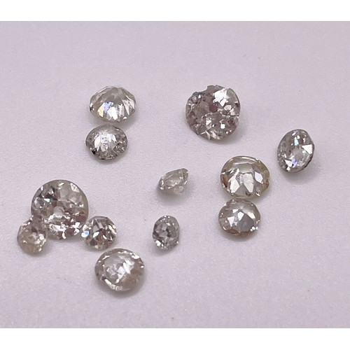 272 - A group of twelve various mixed diamonds, colour range approximately H-L, various sizes. Total weigh... 