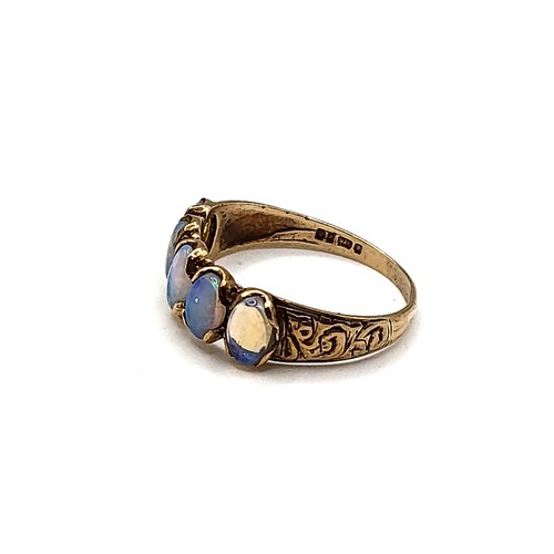 274 - A late 19th / early 20th century 9ct yellow gold and opal ring, set with five oval opals (one a/f), ... 