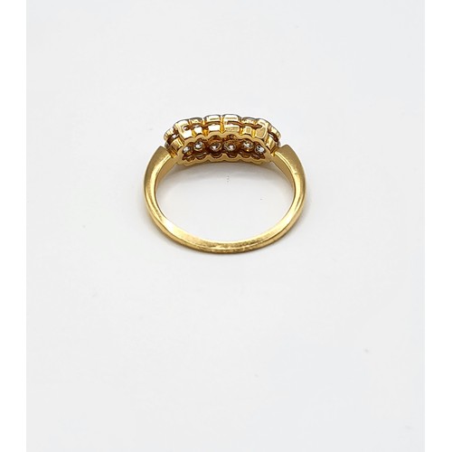 285 - An 18ct yellow gold and diamond ring, pave-set with round brilliant-cut diamonds, size K, 2.7 grams.