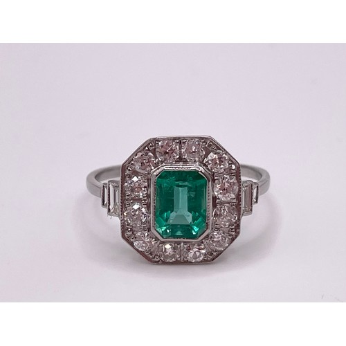 288 - A platinum, diamond, and emerald ring, set with an emerald-cut emerald of approximately 1.0 carats, ... 