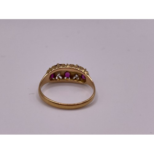 289 - A yellow gold ruby and diamond ring, set with four rubies and four diamonds.