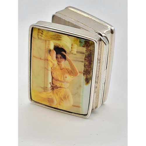 231 - A sterling silver pill box,  the lid with an enamel panel depicting the Neoclassical painting of 'gi... 