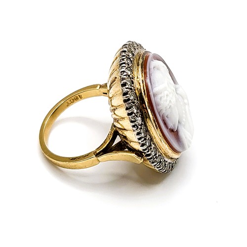 294 - An 18ct yellow gold, diamond, and cameo cocktail ring, the cameo depicting a young woman in profile,... 