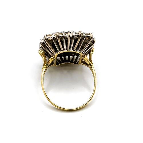 308 - A yellow gold, diamond, and sapphire cocktail ring, set with a flat rectangular-cut dark blue sapphi... 