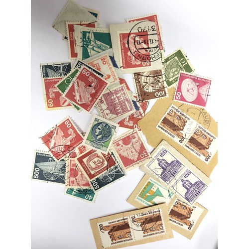 152 - A collection of UK stamps including eleven £5 Queen's head, twelve £1.50 Queen's head, eight £1.00 Q... 