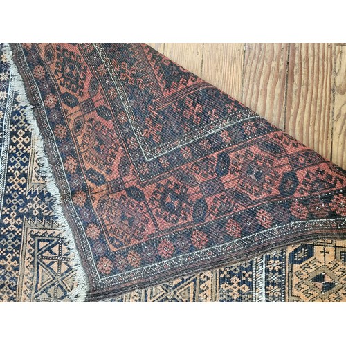 72 - A brown ground floor rug. 120cm x 220cm