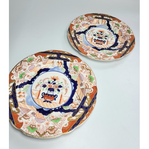 165 - A pair of Spode Arita-style plates pattern 2590, 21.5cm diameter, a rectangular dish, 25cm wide, and... 