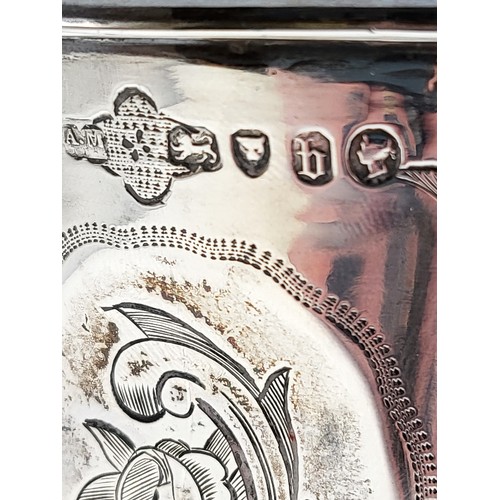 234 - A silver Christening mug, hallmarked London 1857 (indistinct makers mark, A.M) the panelled sides wi... 