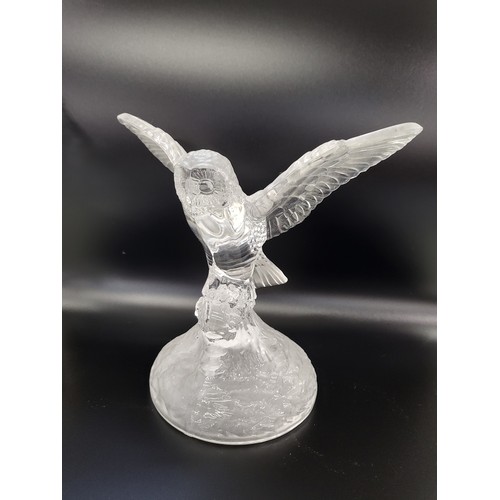 179 - Glass owl, 18cm, hawk, 19cm, and a pair of swans, 19cm. (4)