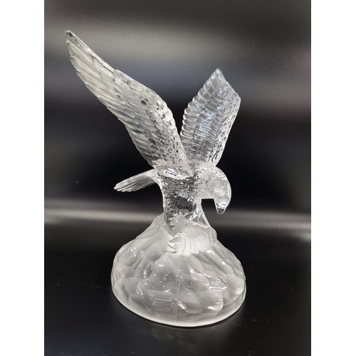 179 - Glass owl, 18cm, hawk, 19cm, and a pair of swans, 19cm. (4)