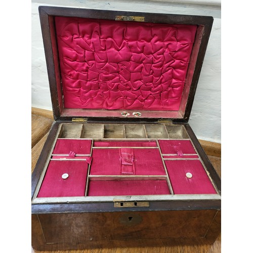 97 - A late 19th / early 20th century green lined sewing box, containing various sewing paraphernalia, to... 