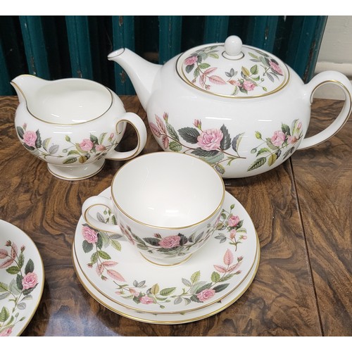 197 - A Royal Albert Brigadoon tea service (30 pieces) and Wedgwood Hathaway Rose tea service (22 pieces).... 