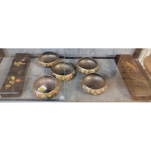 102 - Two Japanese lacquered oblong lidded boxes, both 30cm and five Indian bowls. (7)