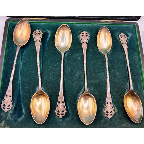 236 - A set of six silver spoons, cased, together with a silver gilt knife, fork and spoon, cased, six sil... 