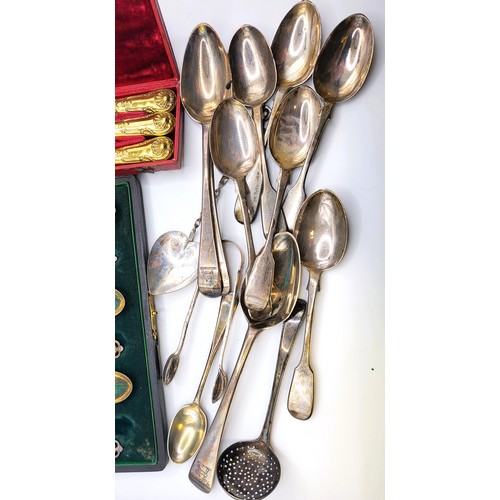 236 - A set of six silver spoons, cased, together with a silver gilt knife, fork and spoon, cased, six sil... 